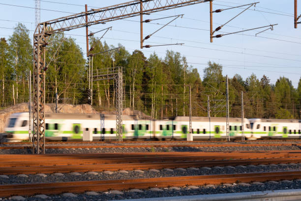 istock Unfocused train passing by a railway junction during the sunset 1399037491