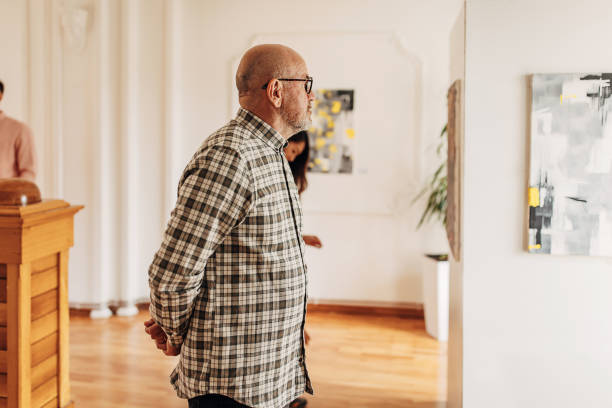 istock Man in art gallery 1399038848