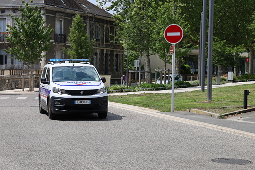 Police car in town, city of Montluçon, Allier department, France