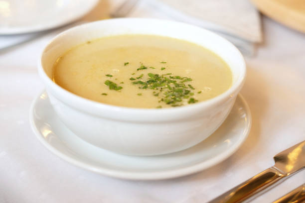 istock cream wild mushroom soup in white bowl -selective focus 1399040852
