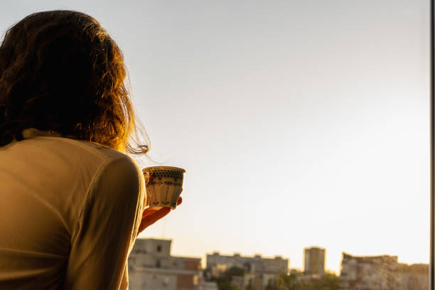 istock Having a cup of coffee at the sunset 1399041590
