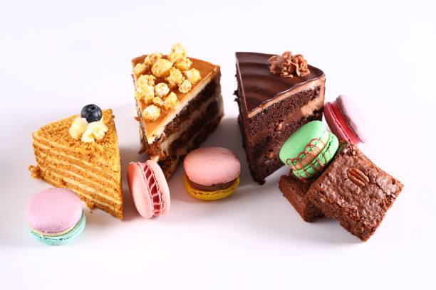 istock assortment of cakes desserts on white background 1399041714