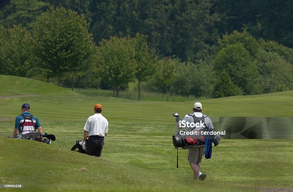 De golf trio - Foto de stock de Caddy libre de derechos