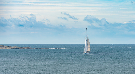 Sailing boat sailing in the open sea