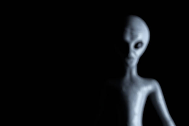 Blurred Background Scary Gray Humanoid Alien. 3d Rendering stock photo