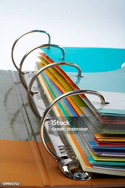 Closeup Of Binder With Stacked Files Stock Photo - Download Image Now - Handbook, Business, Stack