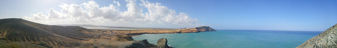 Panoramic view of sea and desert on the coast of the Caribbean Sea in La Guajira. Landscape in the Colombian Caribbean.