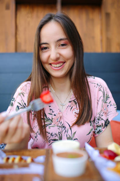 istock happy woman eats chocolate dessert 1399053135