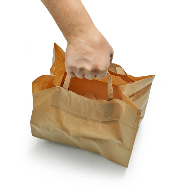 istock paper bag in human hand 1399053230