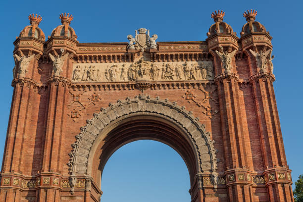 The top of the Arco de Triunfo de Barcelona The triumphal arch at the top of Passeig de Lluís Companys, next to Ciutadella Park. arc de triomf barcelona photos stock pictures, royalty-free photos & images