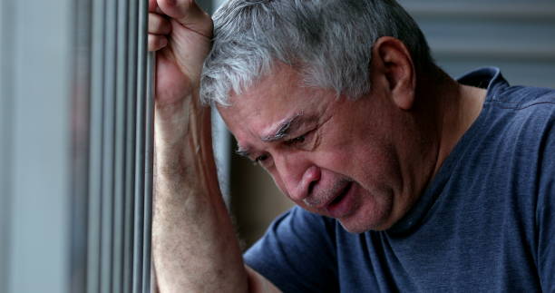 istock Crying older senior man. Depressed sad elder retired person 1399053814