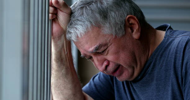 istock Crying older senior man. Depressed sad elder retired person 1399053917