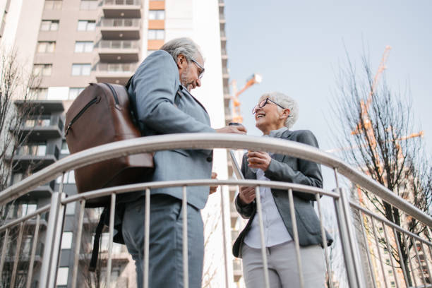istock Senior business people. It is never too late 1399054658