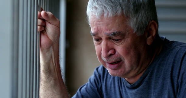 istock Crying older senior man. Depressed sad elder retired person 1399054911