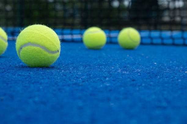 istock five balls on a paddle tennis court, selective focus, 1399056191