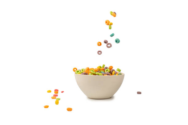 istock Colorful cereal box for morning breakfast. Corn flakes falling to the white bowl. Motion. 1399056298