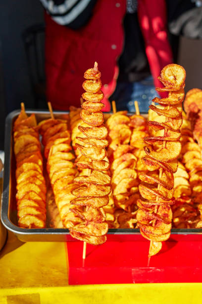 istock potatoes cut into a spiral and fried. tornado potato 1399057893
