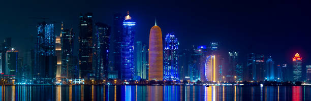 istock Doha skyline with many towers during the night. 1399058934