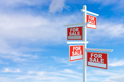 For Sale Real Estate Signs over Clouds and Blue Sky. 3d Rendering