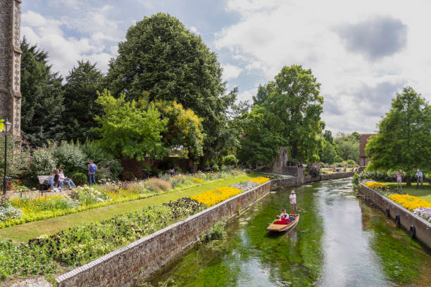people enjoy the beautiful flowered westgate garden canterbury, england. - kent inglaterra imagens e fotografias de stock