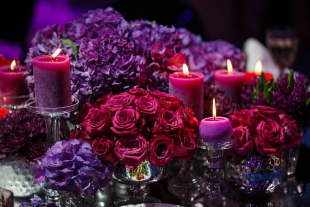 istock Candle and beautiful flowers on the wedding table 1399061762