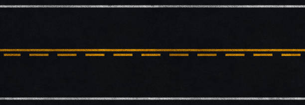 istock panoramic asphalt road with white and yellow marking stripes 1399065923