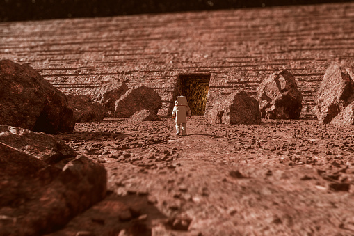 Astronaut discovering secret Martian portal. This entirely 3D generated image.