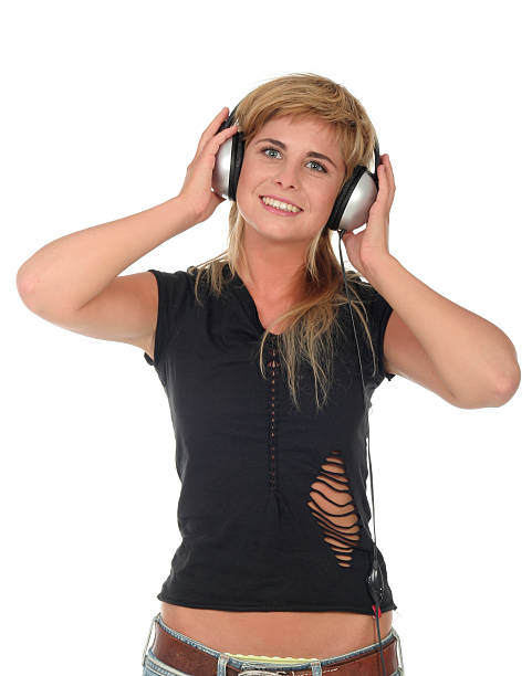 istock Beautiful Woman Enjoying Music 139907136