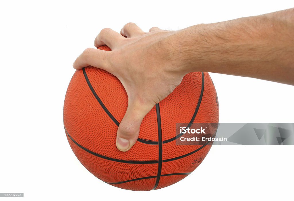 Mão segurando uma bola de basquete isolado - Foto de stock de Bola royalty-free