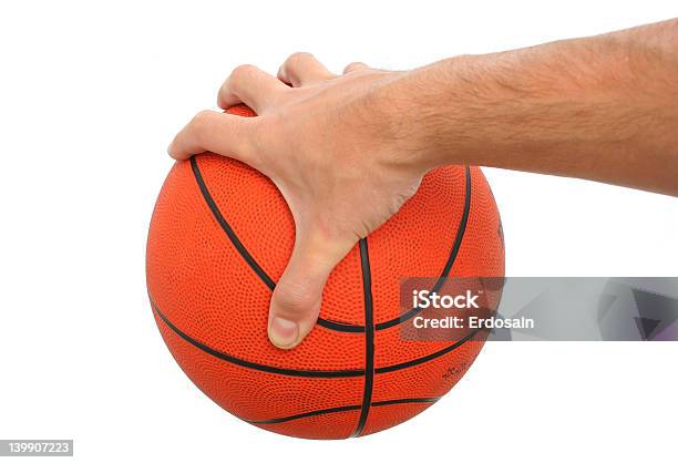 Foto de Mão Segurando Uma Bola De Basquete Isolado e mais fotos de stock de Bola - Bola, Foto de estúdio, Horizontal