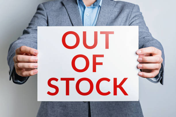 istock Unrecognisable man in grey suit holding a blank white board 1399075131