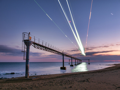 Tías, Spain - October 29, 2021: Approach viewpoint. Long exposure shot of a plane approaching Lanzarote airport.