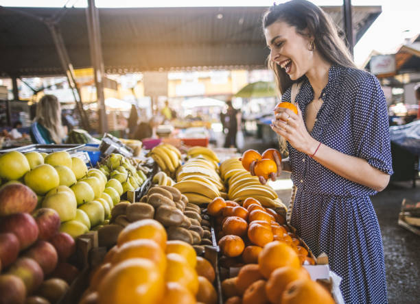 istock Young woman on the market 1399077714