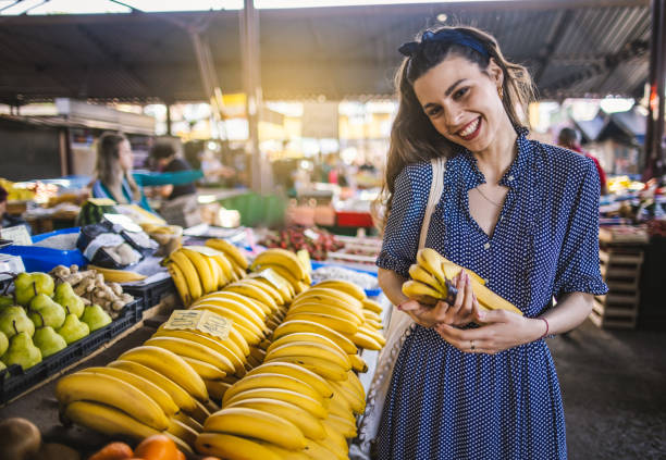istock Young woman on the market 1399077757
