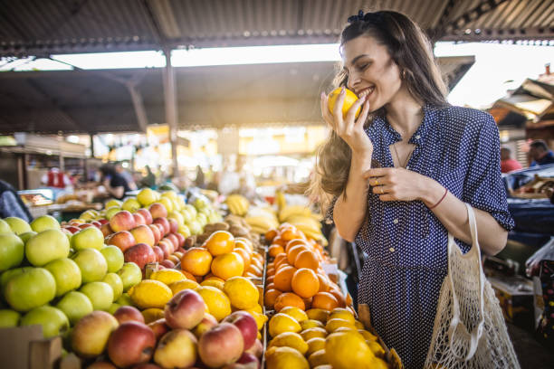 istock Young woman on the market 1399078346