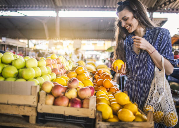istock Young woman on the market 1399078887