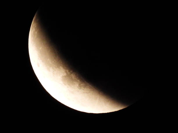 istock Total Lunar Eclipse (Blood Moon) begins Sunday, May 15 2022 when the moon is completely red. Taken @ 12:11AM. 1399084909