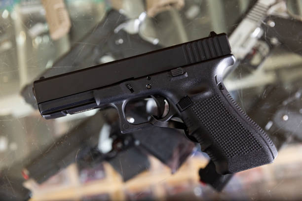 istock Replica of handgun on showcase 1399085125