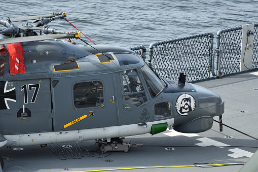 Helicopter landing on warship