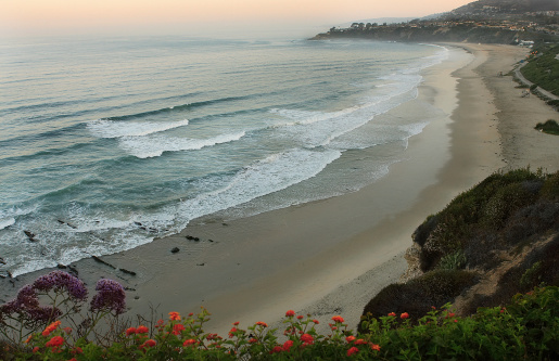 Waves crashing on North Salt Creek Beach, CA just before sunrise.