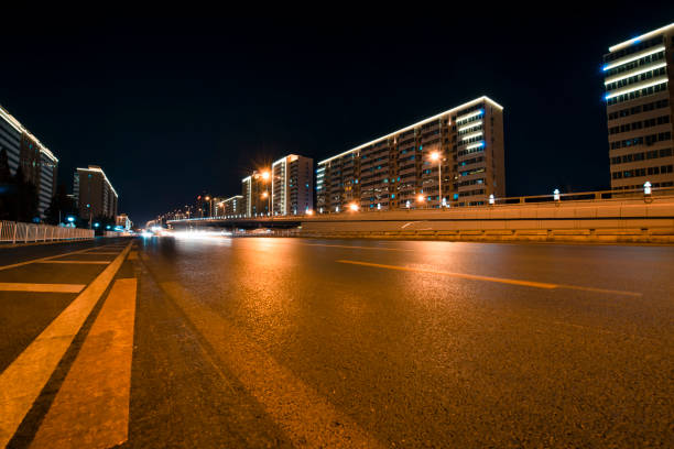 Long exposure of traffic in curve with red and white trails of light