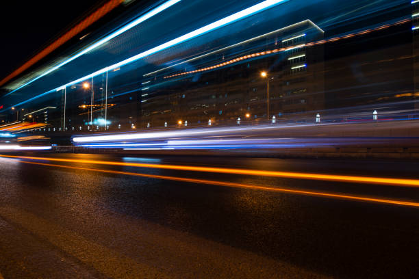 istock Urban highway traffic at night 1399096143