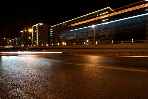 Long exposure of traffic in curve with red and white trails of light