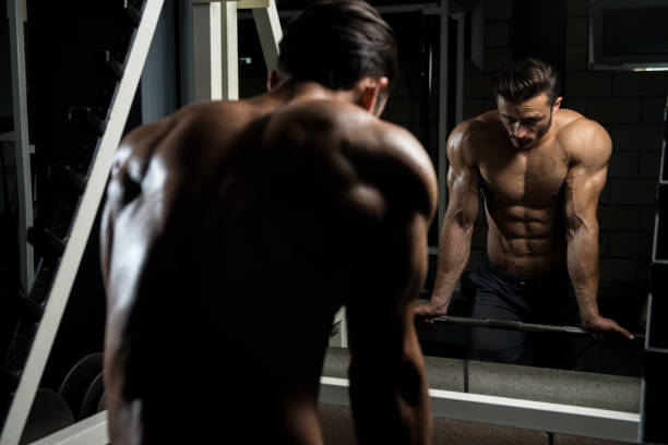 istock Attractive Young Man Resting In Gym Afther Exercise 1399097087