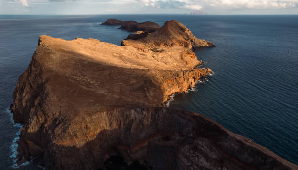 istock Amazing seascape with rocky cliff in sunlight 1399097289