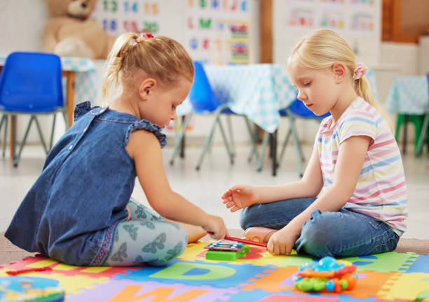 istock Shot of children learning about musical instruments in class 1399099642