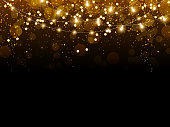 istock Golden glitter confetti falling on black vector background. Shining gold shimmer luxury design card 1399105128
