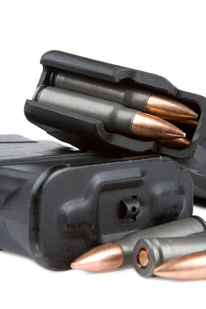 istock Clip of ammunition on a white. 139911400