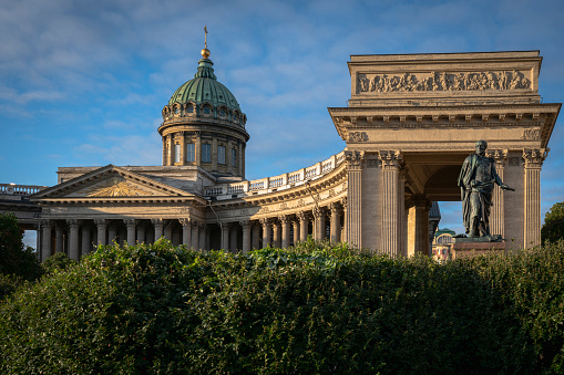 Kazan Cathedral (Cathedral of the Kazan Icon of the Mother of God) on Nevsky Prospekt and the monument to Barclay de Tolly in the morning sun, St. Petersburg, Russia