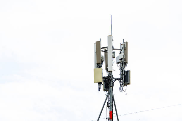 Telecommunication tower of 5G and 5G cellular. Macro Base Station. 6G radio network telecommunication equipment with radio modules and smart antennas mounted on a metal stock photo